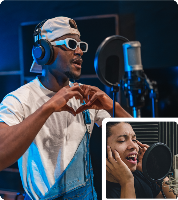 A person in white sunglasses sings into a studio microphone, while another person with headphones sings passionately into a separate microphone.